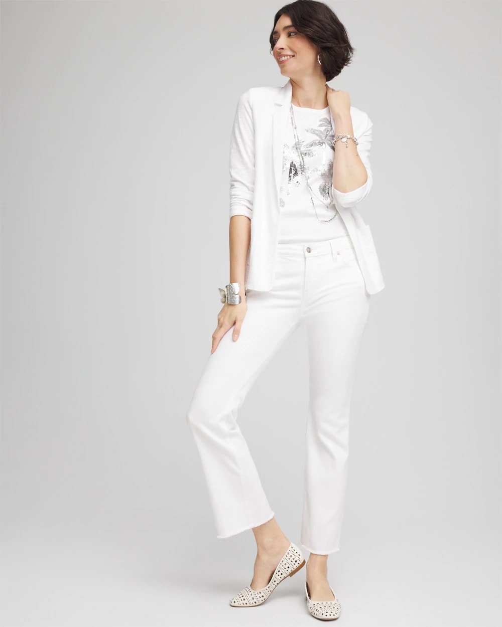 Chico's Women | Petite No Stain Girlfriend Fray Hem Kick Flare Jeans ALABASTER